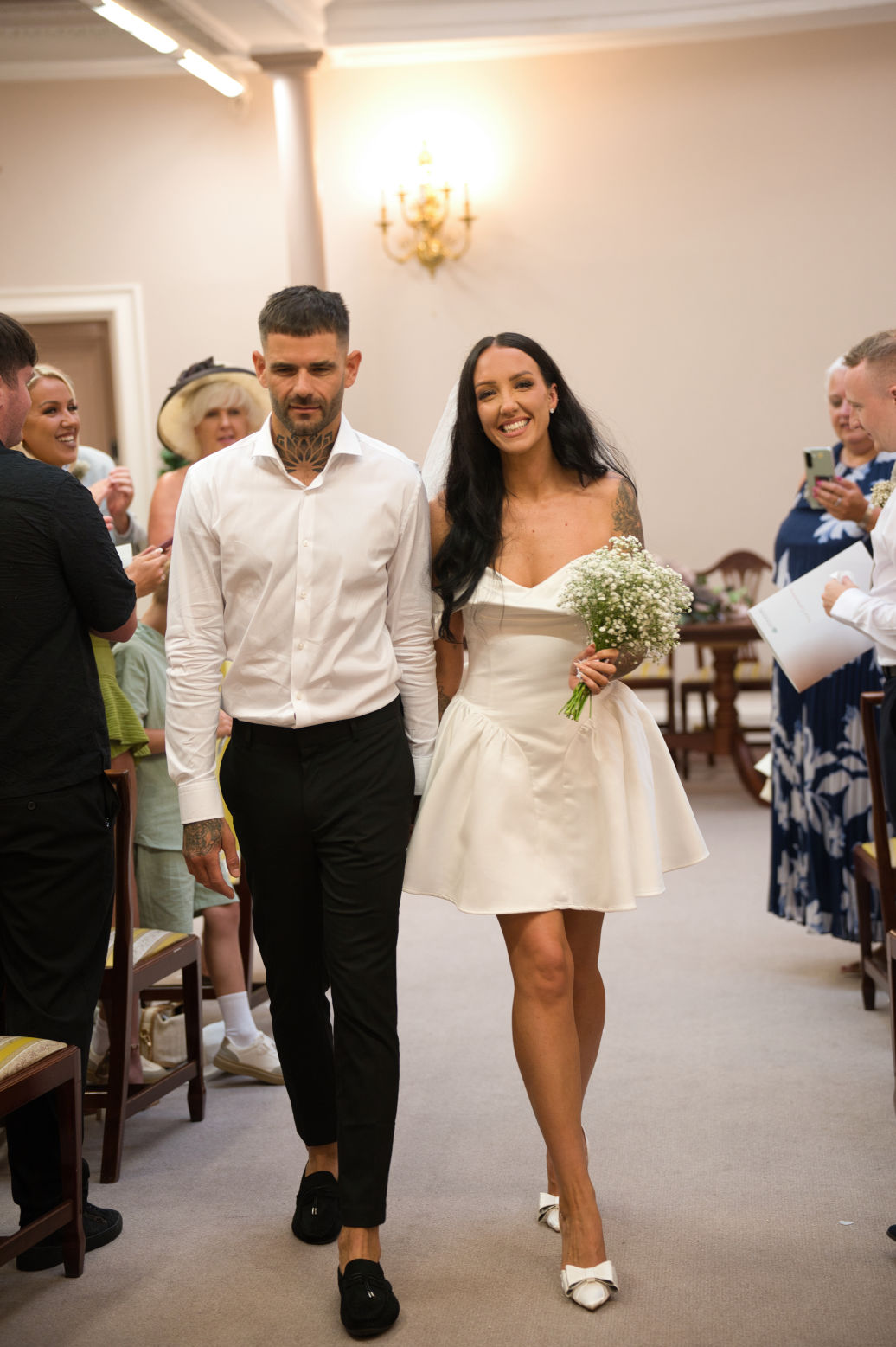 Couple holding hands after Cheshire micro wedding